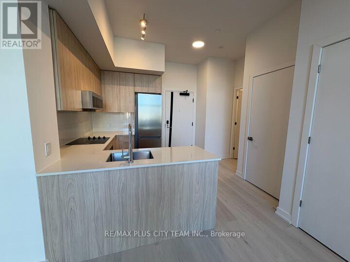 104 - 2501 Saw Whet Boulevard, Oakville, Ontario  L6M 5N2 - Photo 4 - W12960366