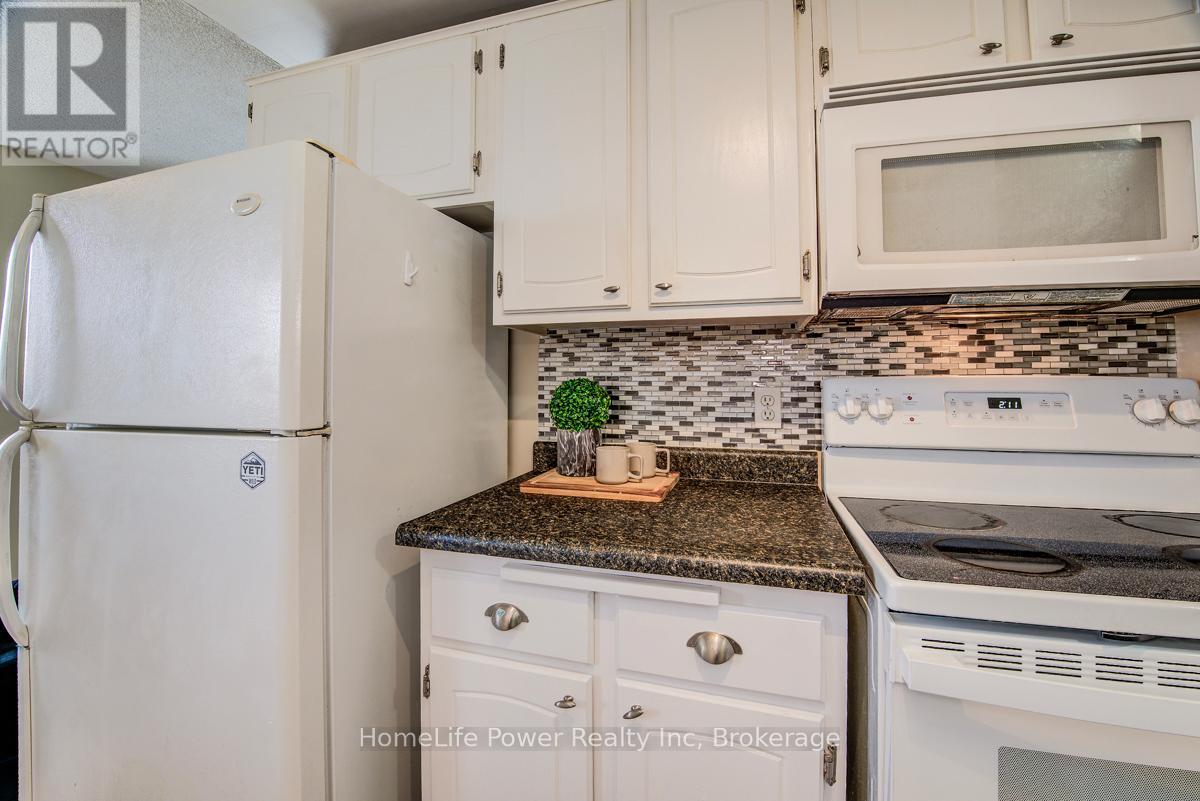 303 - 4 Avalon Place, Kitchener, Ontario  N2M 4N6 - Photo 9 - X12972884