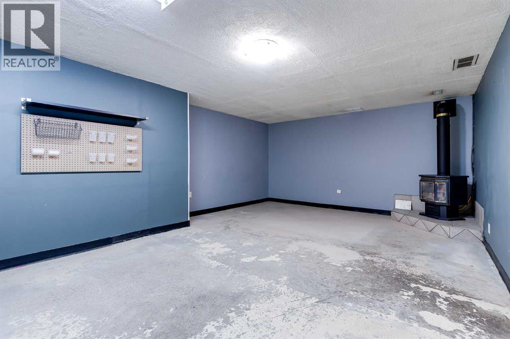 21 Mountain Circle SE, Airdrie, Alberta  T4A 1X8 - Photo 26 - A2299433