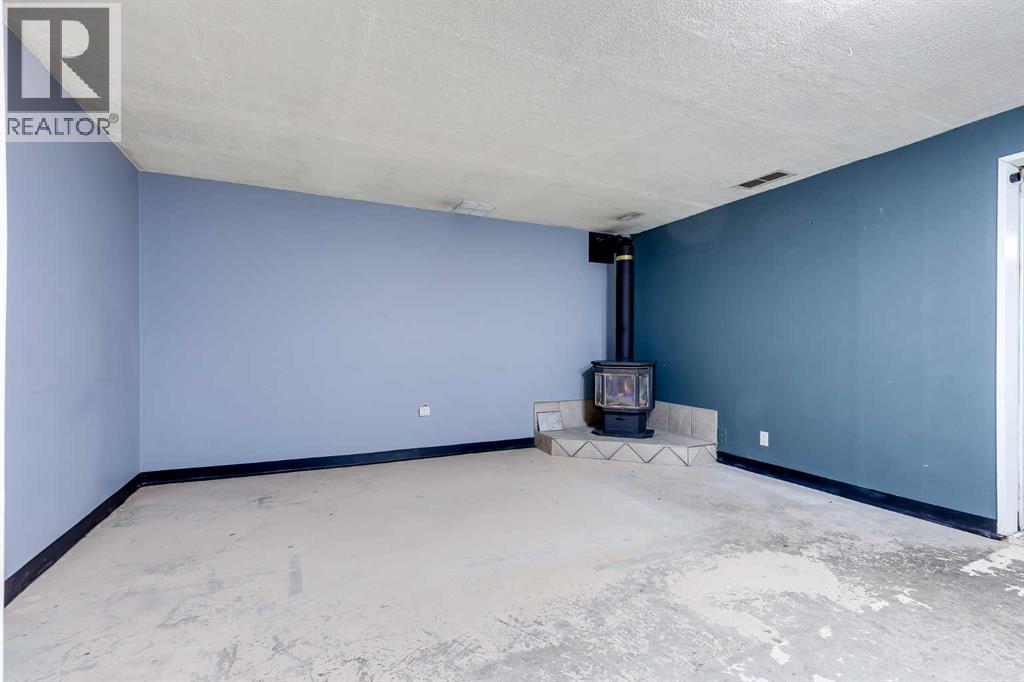 21 Mountain Circle SE, Airdrie, Alberta  T4A 1X8 - Photo 27 - A2299433