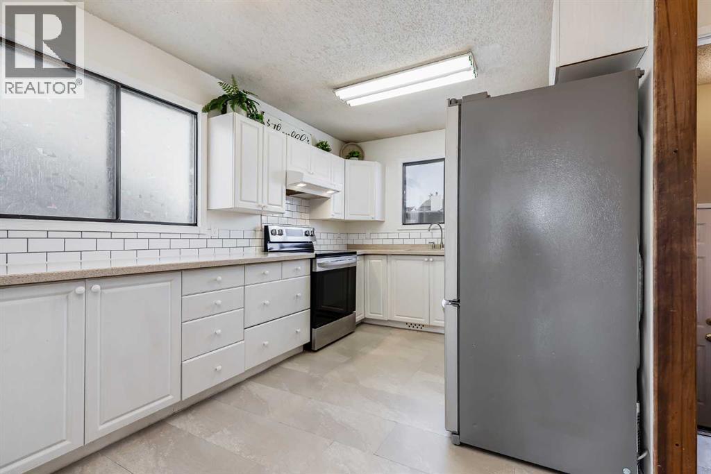 21 Mountain Circle SE, Airdrie, Alberta  T4A 1X8 - Photo 9 - A2299433