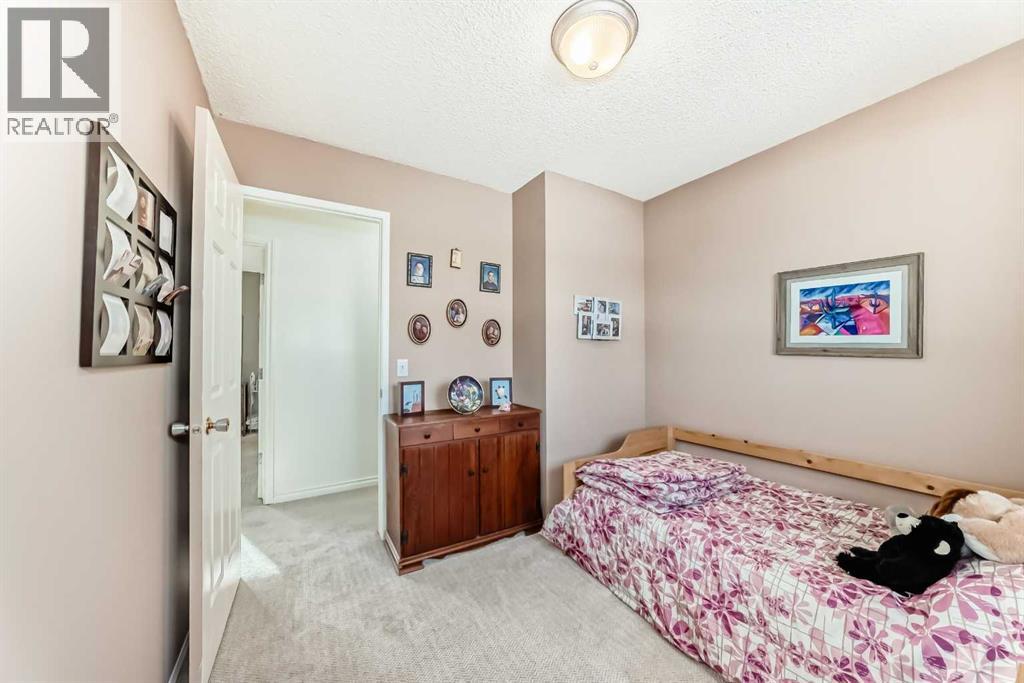 8 Meadow Place SE, Airdrie, Alberta  T4A 1W4 - Photo 24 - A2299404