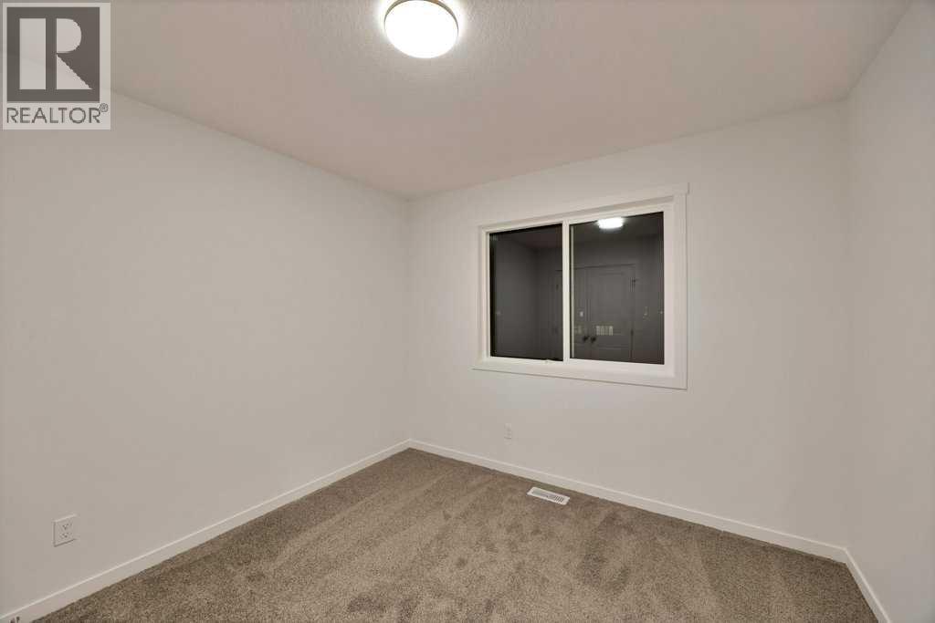 561 Chelsea Gardens, Chestermere, Alberta  T1X 2V4 - Photo 35 - A2280508