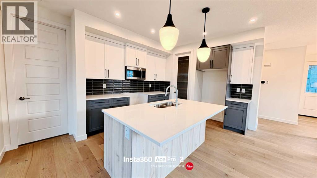 277 Waterford Way, Chestermere, Alberta  T1X 2Z6 - Photo 4 - A2296572