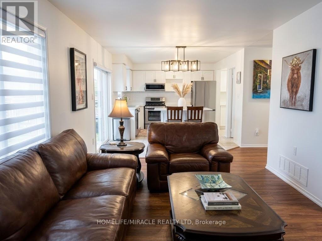 65 Fairhill Avenue, Brampton, Ontario  L7A 2E8 - Photo 7 - W12968006