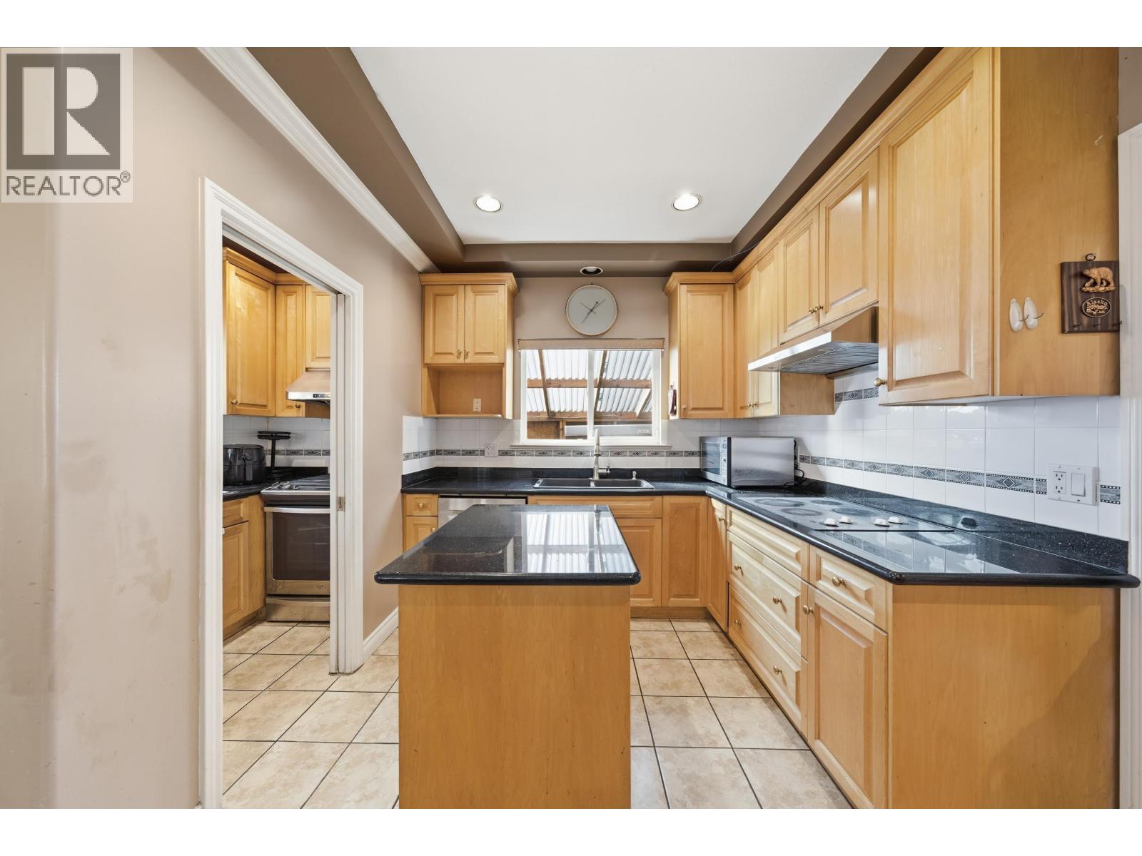 7962 Victoria Drive, Vancouver, British Columbia  V5P 4A5 - Photo 9 - R3108459