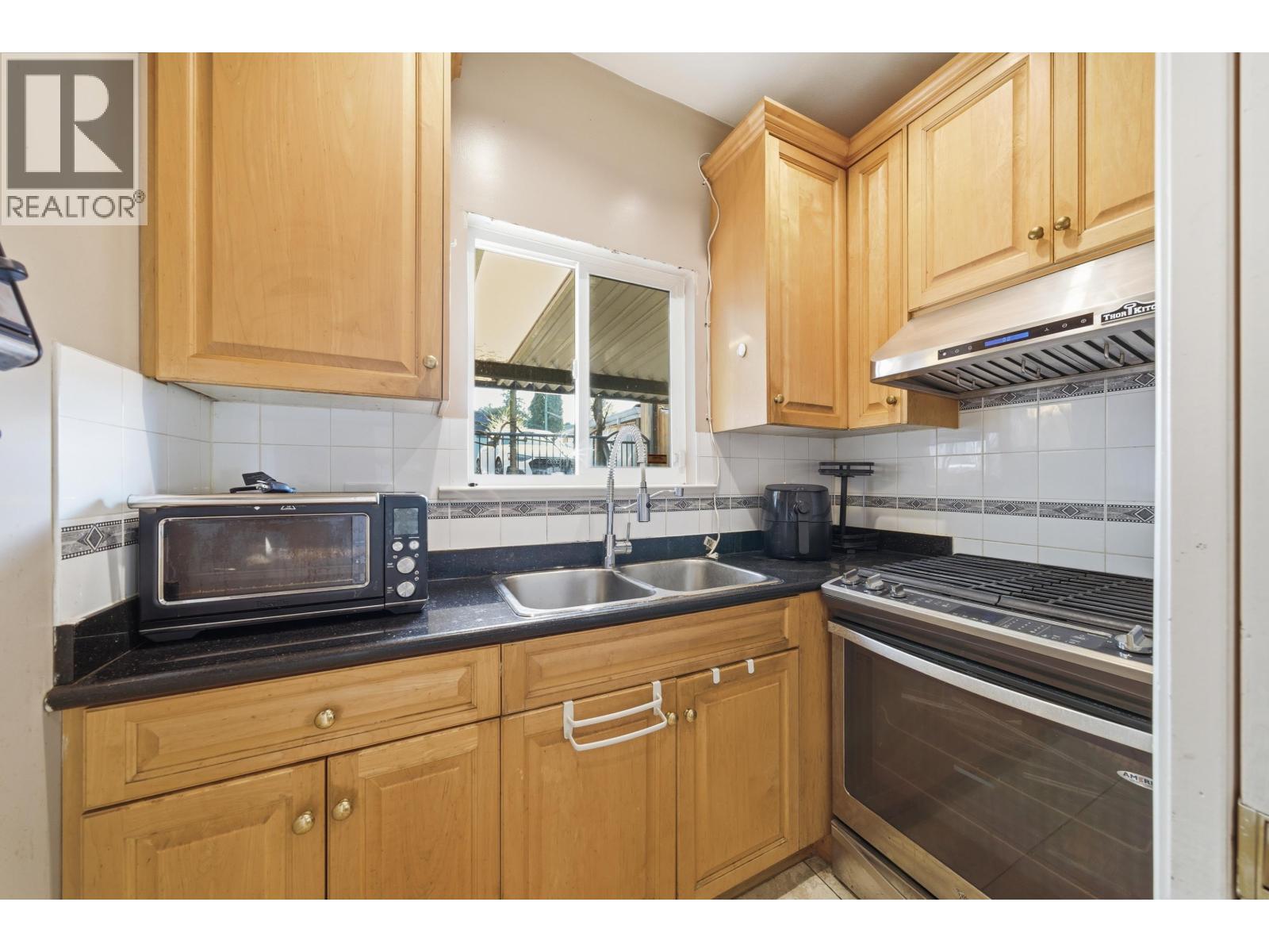 7962 Victoria Drive, Vancouver, British Columbia  V5P 4A5 - Photo 8 - R3108459