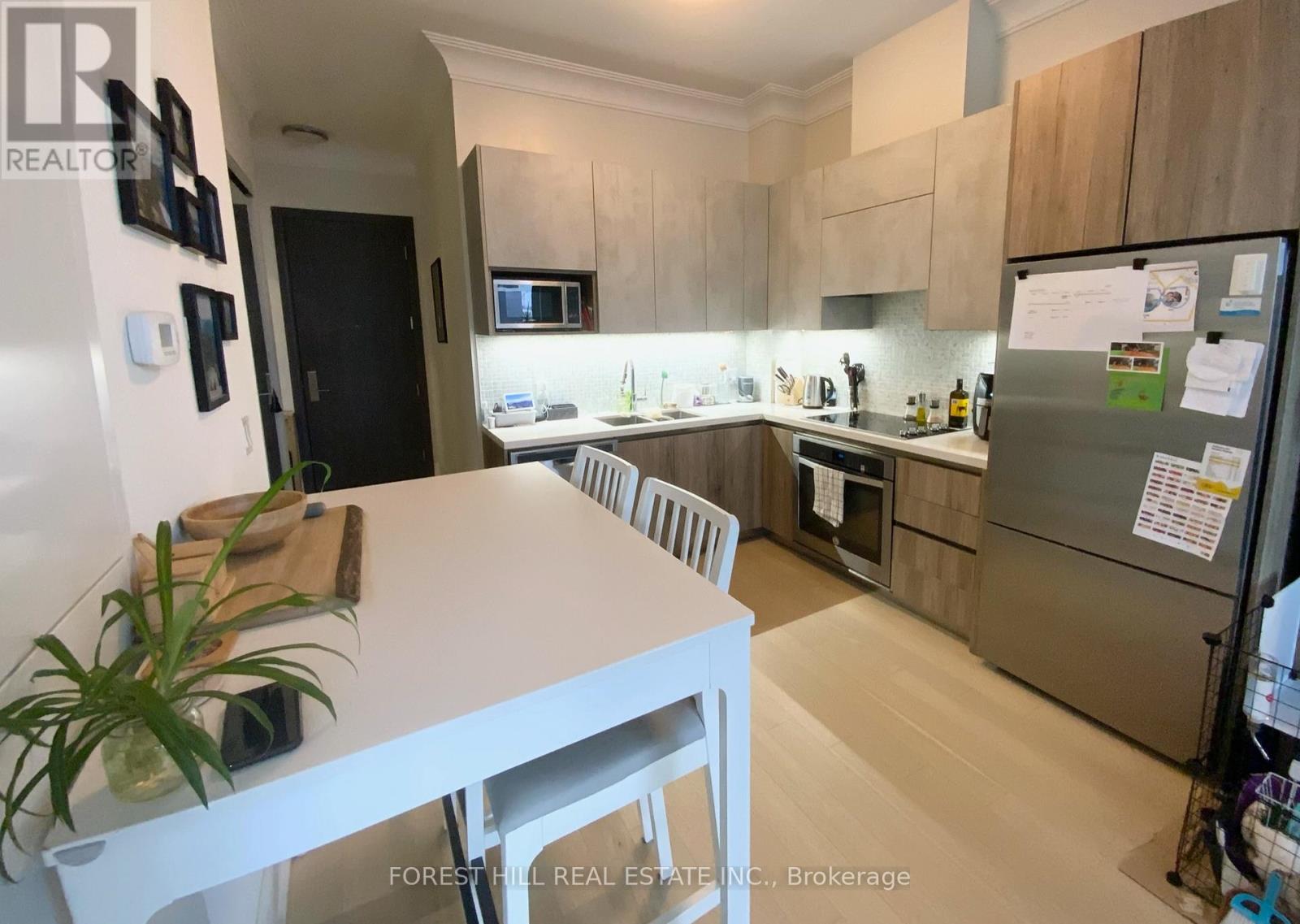 Rg27 - 25 Water Walk Drive, Markham, Ontario  L6G 0G3 - Photo 2 - N12973228