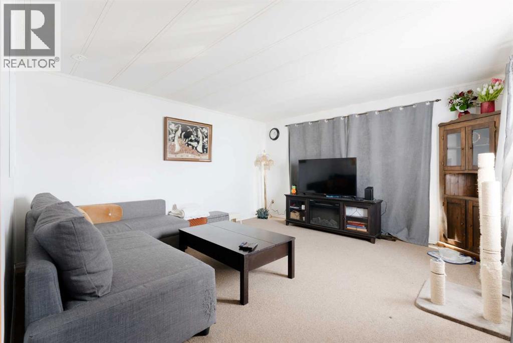 302, 6220 17 Avenue Se, Calgary, Alberta  T2A 0W6 - Photo 2 - A2283600