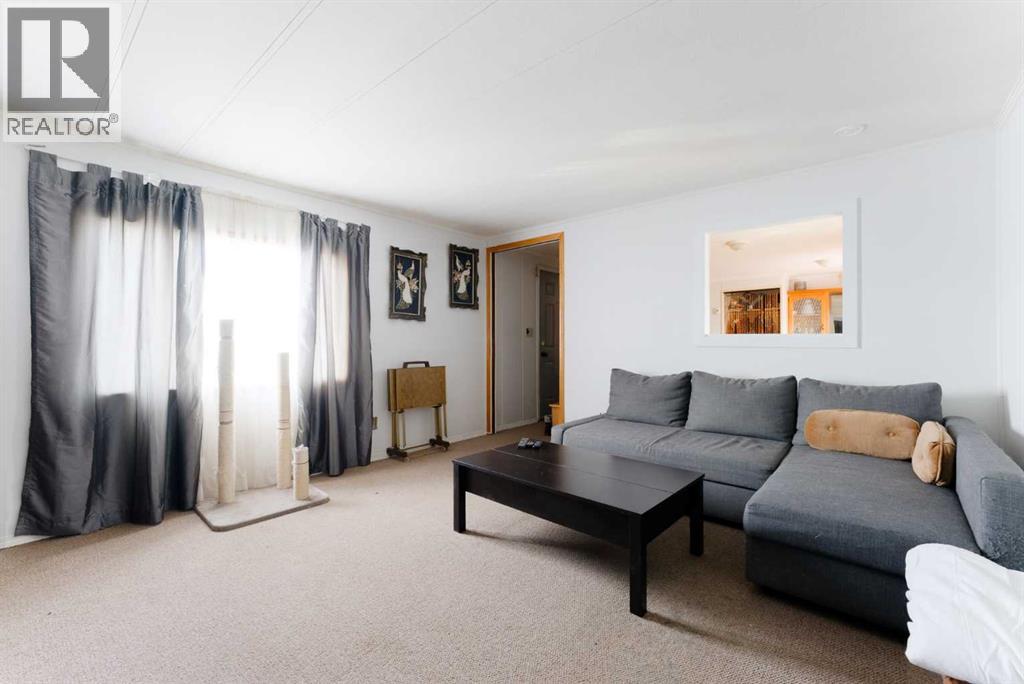 302, 6220 17 Avenue Se, Calgary, Alberta  T2A 0W6 - Photo 1 - A2283600