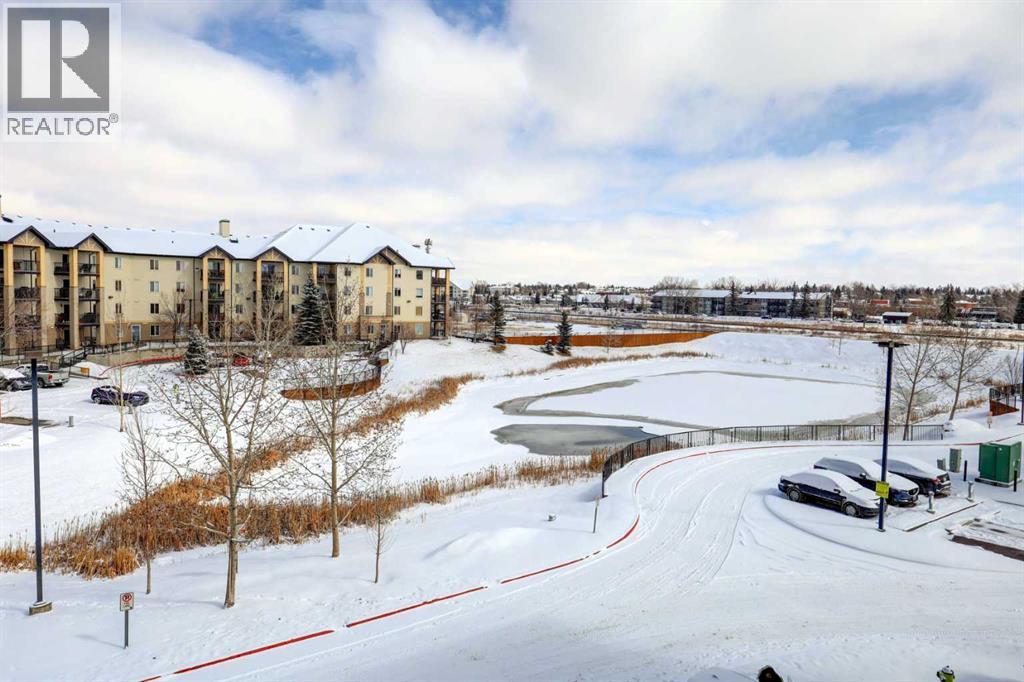 7303, 304 Mackenzie Way SW, Airdrie, Alberta