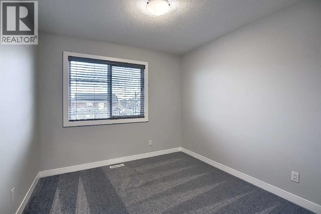 322 Sundown Road, Cochrane, Alberta  T4C 3H2 - Photo 20 - A2193822