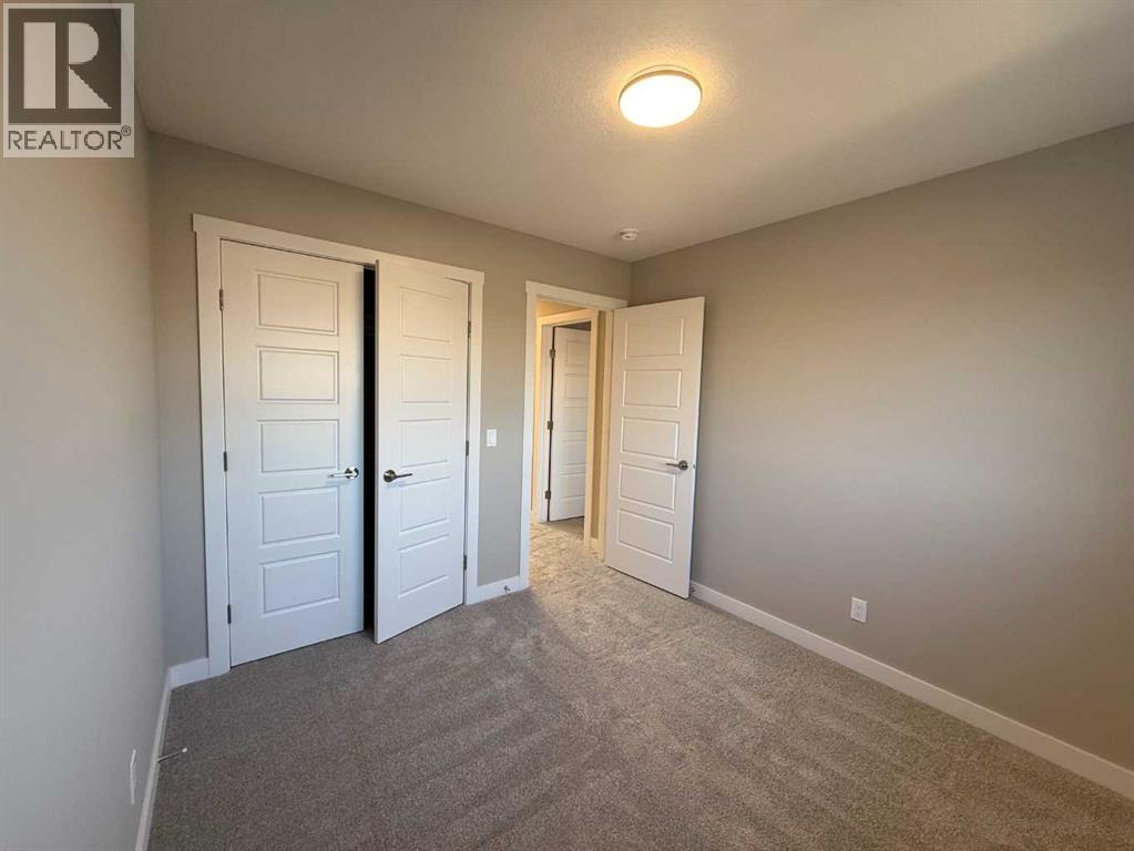 302 Sundown Road, Cochrane, Alberta  T4C 3H2 - Photo 16 - A2256036