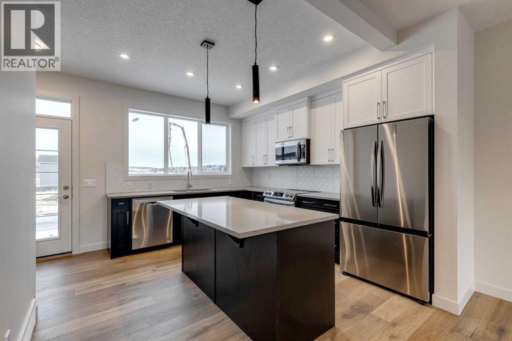 16 Sundown Place, Cochrane, Alberta  T4C 3H2 - Photo 6 - A2269276