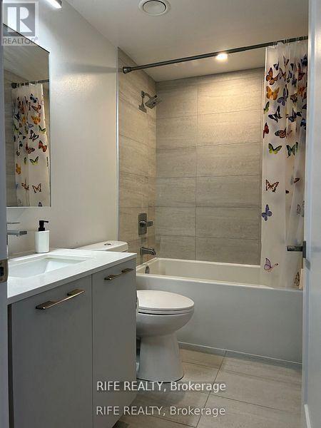 1002 - 18 Water Walk Drive, Markham, Ontario  L3R 6L5 - Photo 4 - N12973894