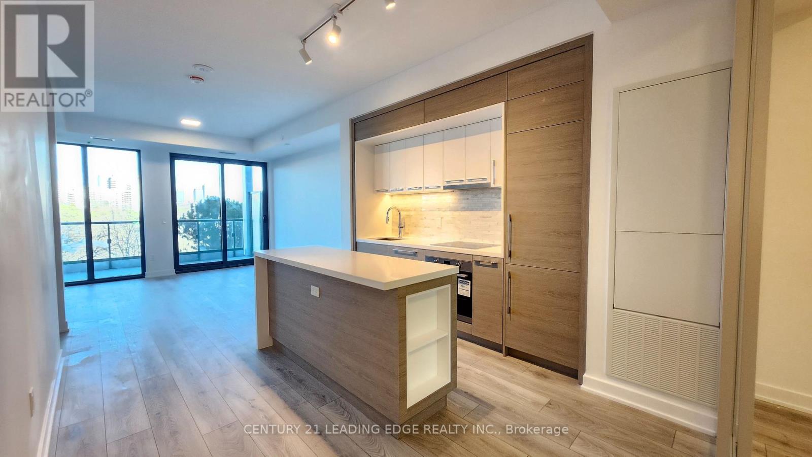 302 - 29 Green Trail Court, Toronto, Ontario  M3C 3S2 - Photo 2 - C12973926