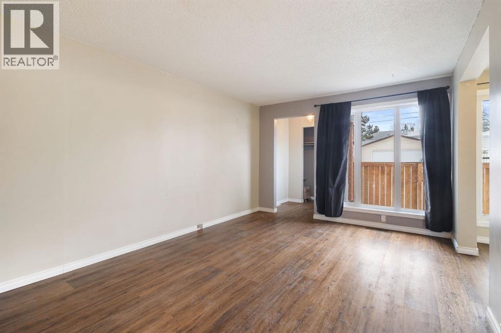 6, 6147 Buckthorn Road Nw, Calgary, Alberta  T2K 2Z2 - Photo 4 - A2278314