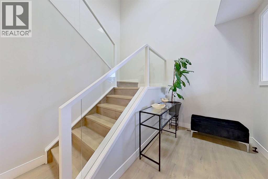 105 Chokecherry Ridge, Rural Rocky View County, Alberta  T3Z 0G3 - Photo 3 - A2289585