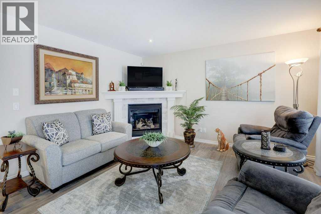 2033 Sagewood Point Sw, Airdrie, Alberta  T4b 3P1 - Photo 9 - A2293088