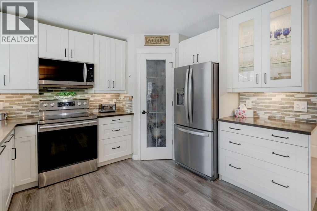 2033 Sagewood Point Sw, Airdrie, Alberta  T4b 3P1 - Photo 5 - A2293088