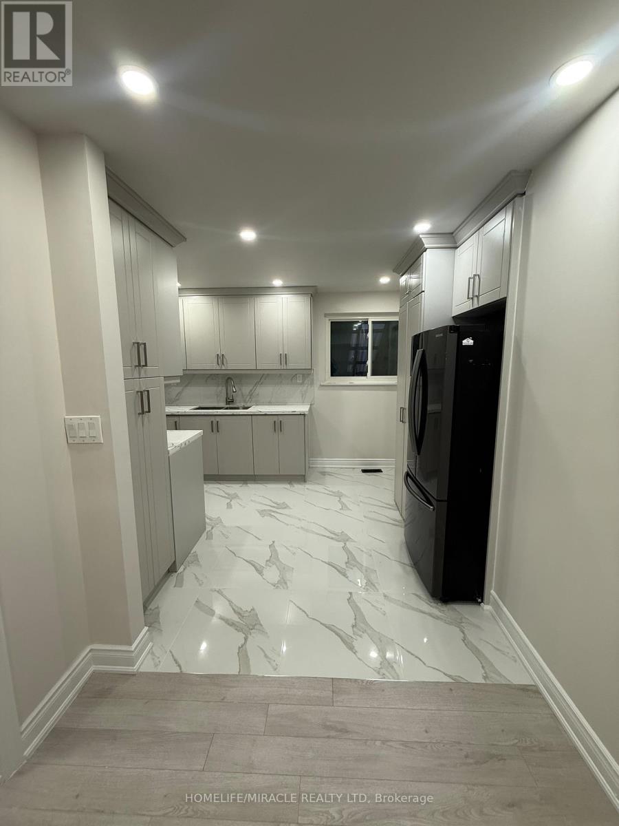 6 Strathavon Drive, Toronto (Mount Olive-Silverstone-Jamestown), Ontario  M9V 2H5 - Photo 4 - W12974238