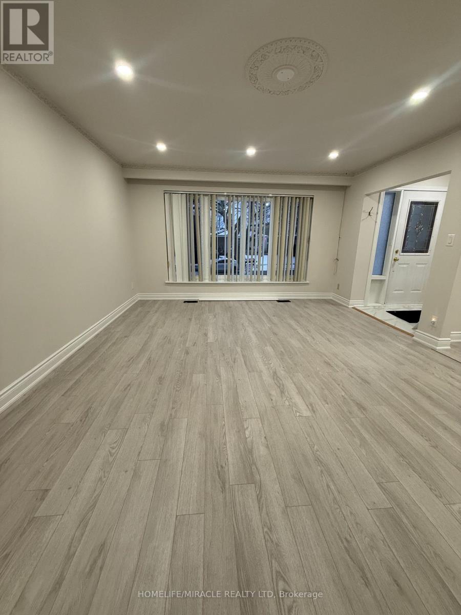 6 Strathavon Drive, Toronto (Mount Olive-Silverstone-Jamestown), Ontario  M9V 2H5 - Photo 5 - W12974238