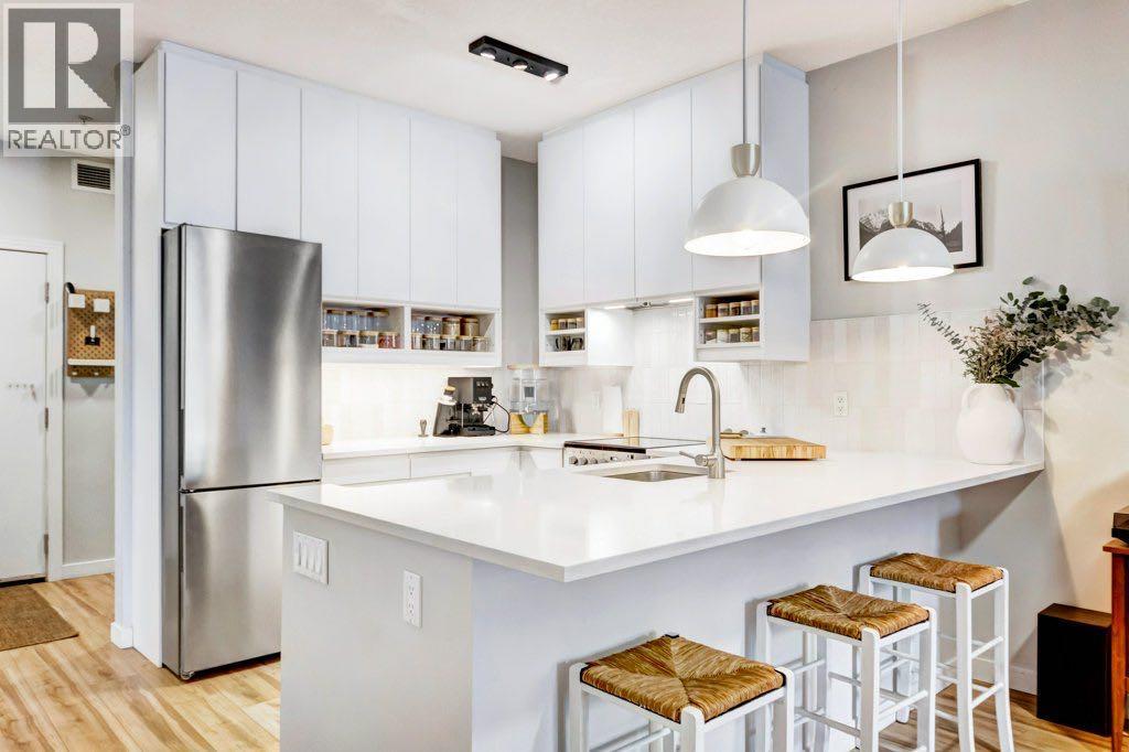 109, 1408 17 Street Se, Calgary, Alberta  T2G 5S8 - Photo 1 - A2290135