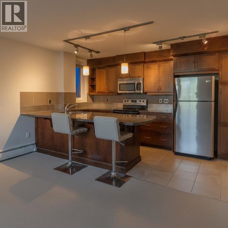 104, 1534 15 Avenue Sw, Calgary, Alberta T3C 0X9 - Photo 3 - A2286908