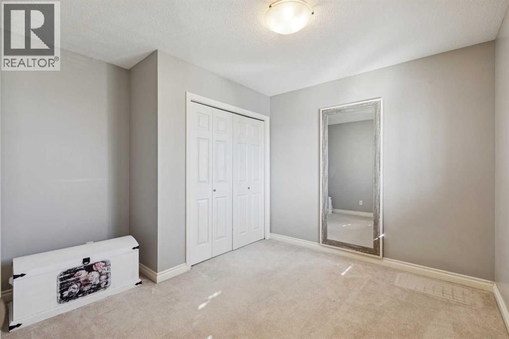 107 Sheep River Bay, Okotoks, Alberta  T1S 1R3 - Photo 21 - A2298402