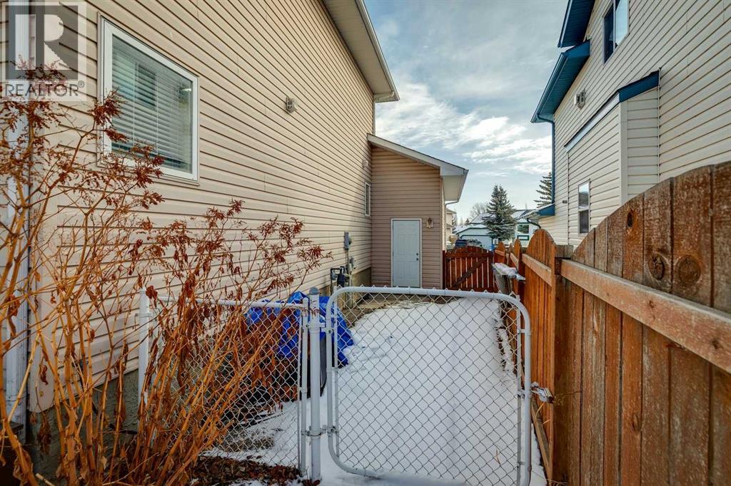 107 Sheep River Bay, Okotoks, Alberta  T1S 1R3 - Photo 30 - A2298402