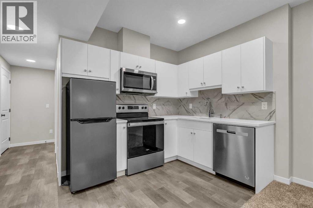 249 Aquila Drive NW, Calgary, Alberta  T3R 1Y6 - Photo 23 - A2298108