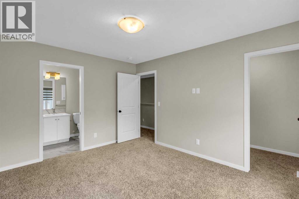 249 Aquila Drive NW, Calgary, Alberta  T3R 1Y6 - Photo 8 - A2298108