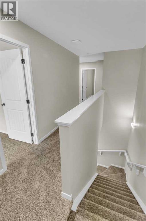 249 Aquila Drive NW, Calgary, Alberta  T3R 1Y6 - Photo 5 - A2298108