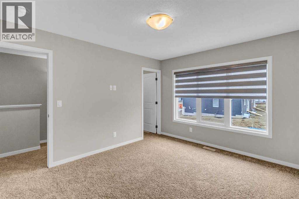 249 Aquila Drive NW, Calgary, Alberta  T3R 1Y6 - Photo 7 - A2298108