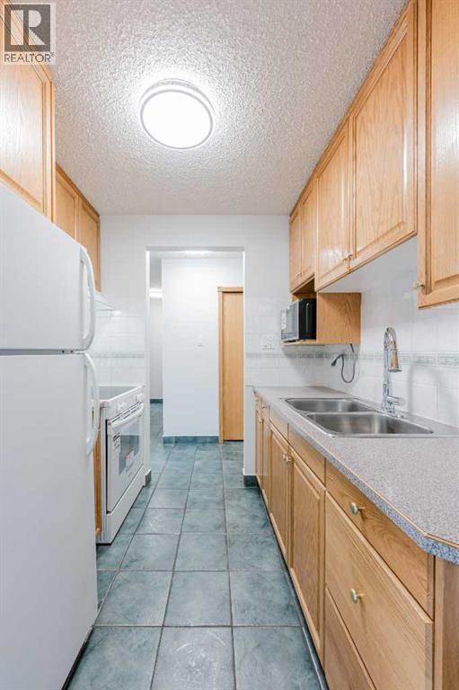 303, 635 56 Avenue Sw, Calgary, Alberta  T2V 0G9 - Photo 5 - A2287910