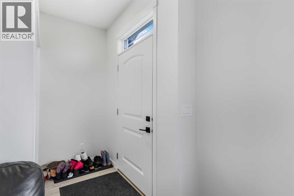 15 Edith Passage NW, Calgary, Alberta  T3R 2B6 - Photo 3 - A2272609