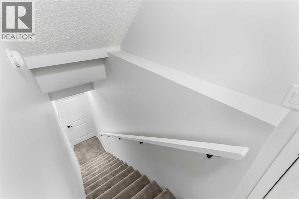 15 Edith Passage NW, Calgary, Alberta  T3R 2B6 - Photo 34 - A2272609