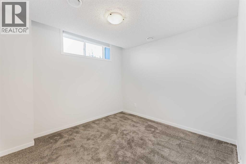 15 Edith Passage NW, Calgary, Alberta  T3R 2B6 - Photo 40 - A2272609