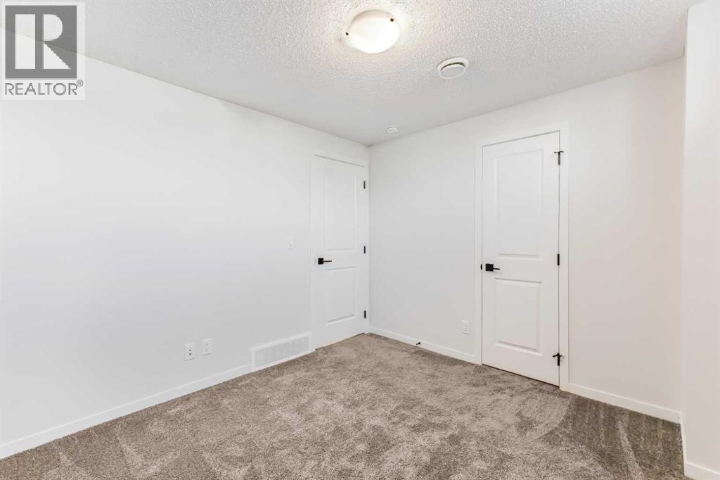 15 Edith Passage NW, Calgary, Alberta  T3R 2B6 - Photo 41 - A2272609