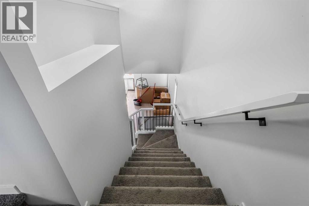 15 Edith Passage NW, Calgary, Alberta  T3R 2B6 - Photo 19 - A2272609