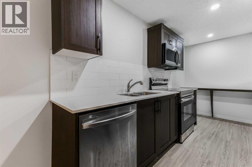 15 Edith Passage NW, Calgary, Alberta  T3R 2B6 - Photo 38 - A2272609