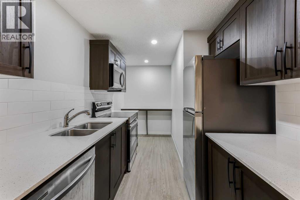 15 Edith Passage NW, Calgary, Alberta  T3R 2B6 - Photo 37 - A2272609