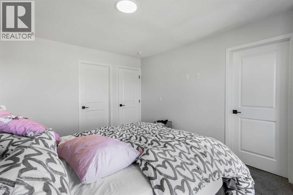 15 Edith Passage NW, Calgary, Alberta  T3R 2B6 - Photo 22 - A2272609