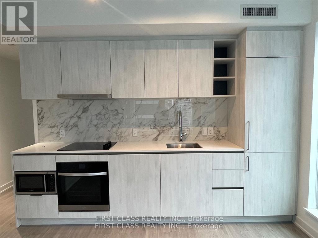 1703 - 8 Wellesley Street W, Toronto, Ontario  M4Y 0J5 - Photo 2 - C12965970