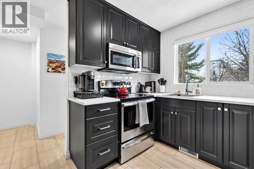 63 Amiens Crescent SW, Calgary, Alberta  T2T 6E9 - Photo 14 - A2299964