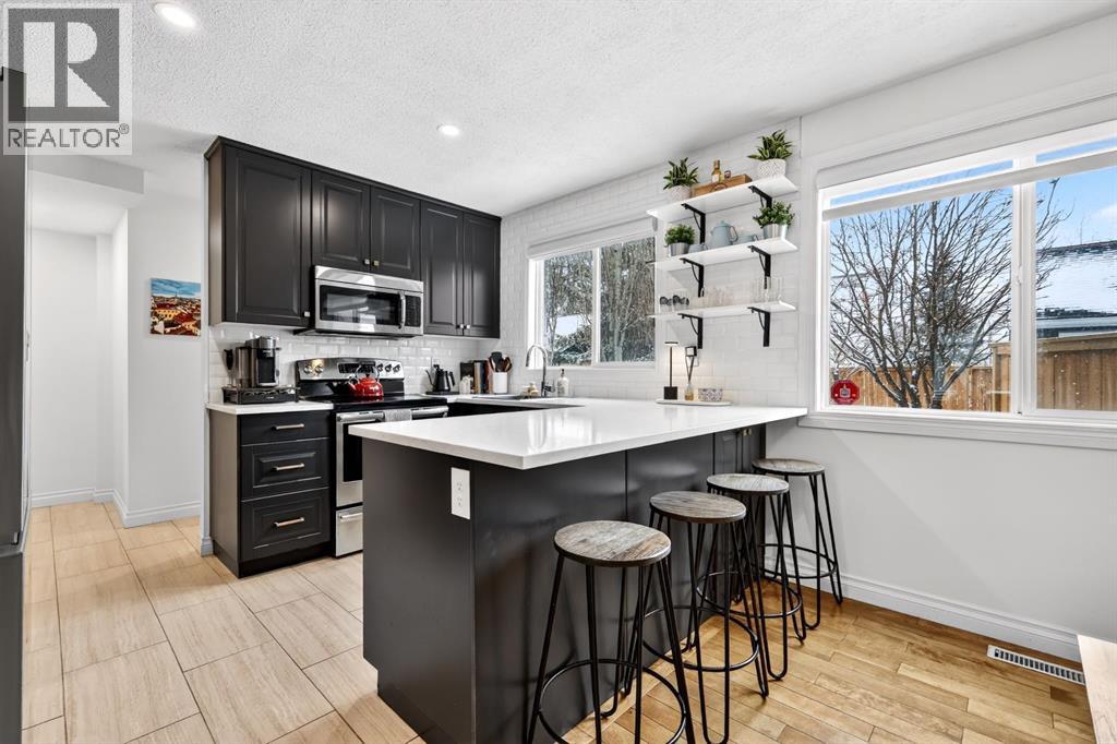 63 Amiens Crescent SW, Calgary, Alberta  T2T 6E9 - Photo 11 - A2299964