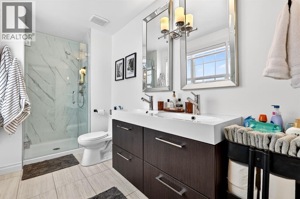 63 Amiens Crescent SW, Calgary, Alberta  T2T 6E9 - Photo 29 - A2299964