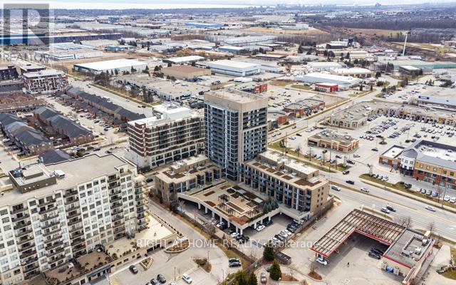 1405 - 1940 Ironstone Drive, Burlington, Ontario  L7L 0E4 - Photo 3 - W12974742