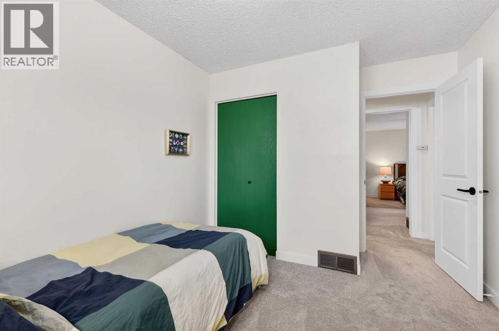 584 Woodhill Place SW, Calgary, Alberta  T2W 3L5 - Photo 23 - A2298867