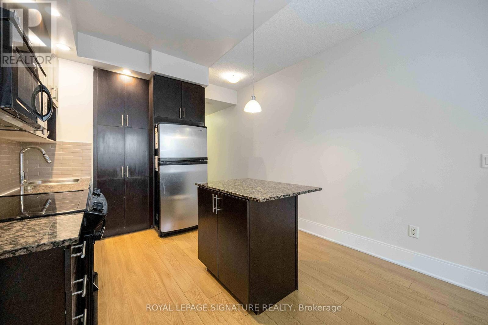 403 - 181 Wynford Drive, Toronto, Ontario M3C 0C6 - Photo 5 - C12975344